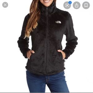 Black fuzzy north face jacket